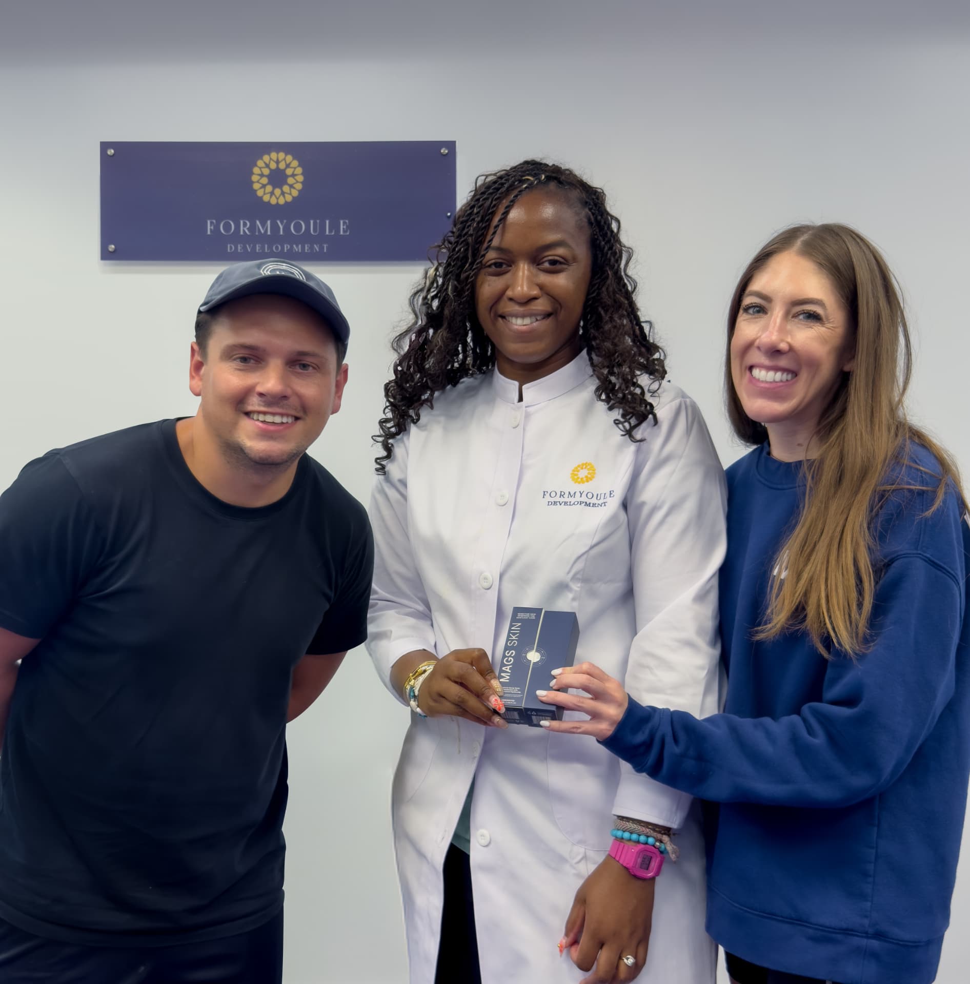 MAGS Skin founders Christine, Ingrid and Steven holding a MAGS Skin deodorant box at the Formyoule development lab